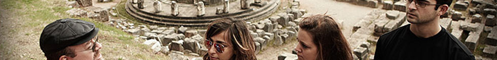 Students and instructor overlooking ruins