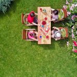 Family,And,Friends,Eating,Together,Outdoors,On,Summer,Garden,Party.